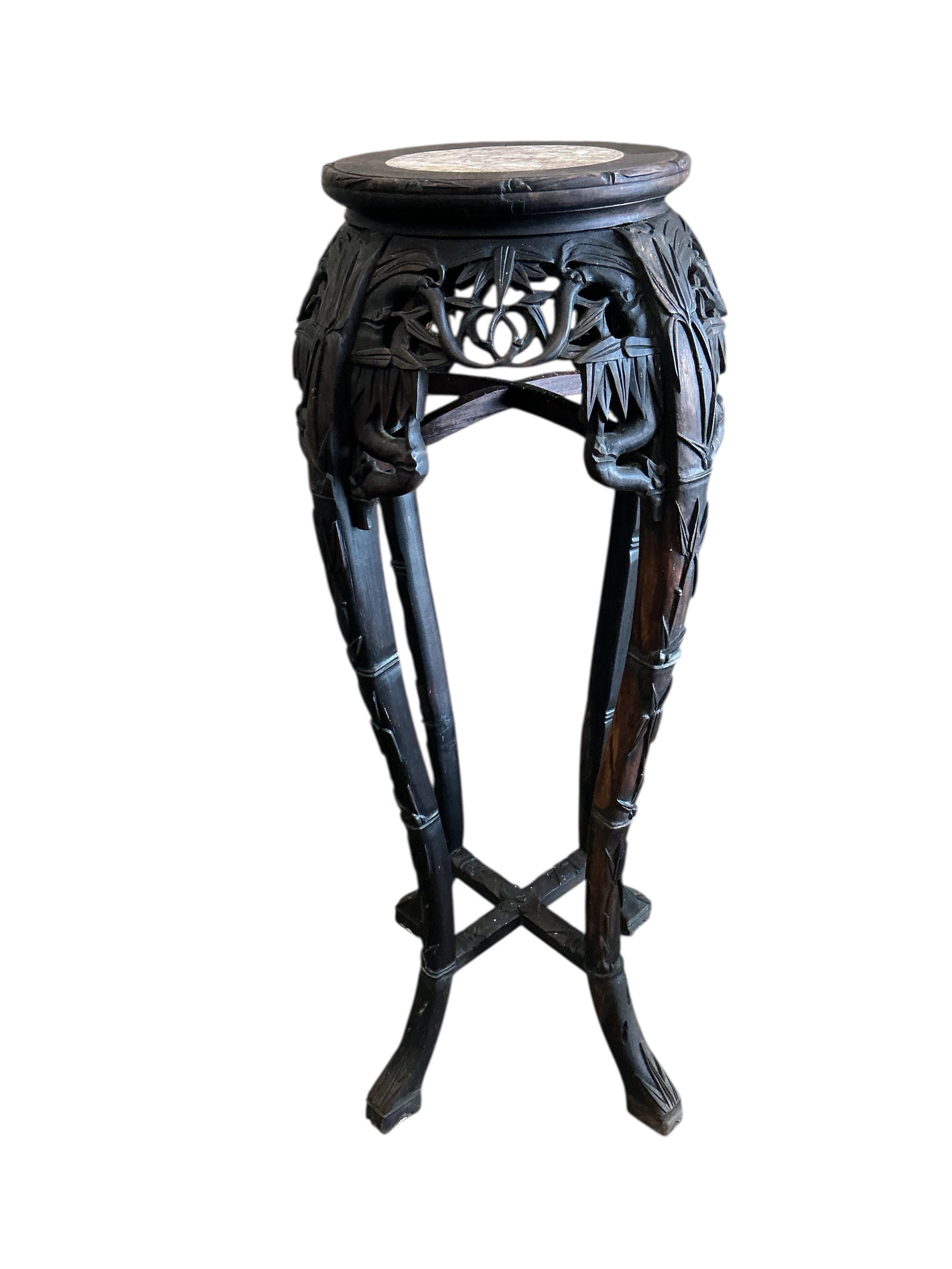 A Chinese carved hardwood marble top vase stand, height 92cm
